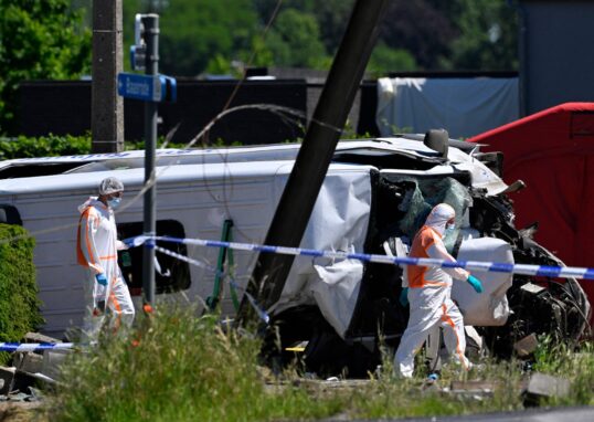 Four people killed after minibus collides with train in Belgium