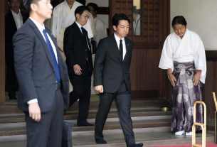 Japanese minister visits shrine to war dead, angering China, South Korea