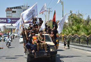 Photos: Patriotic music and flags mark Taliban rule anniversary in Kabul