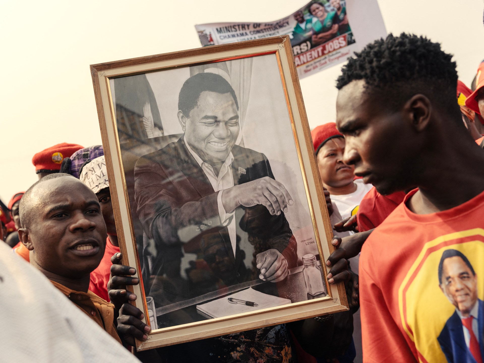 Zambia incumbent takes early election lead as opposition alleges armed raid